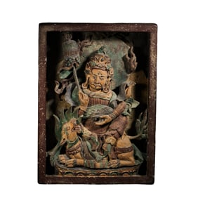 Painted brick carving of the seated God of Wealth from the Ming Dynasty, China