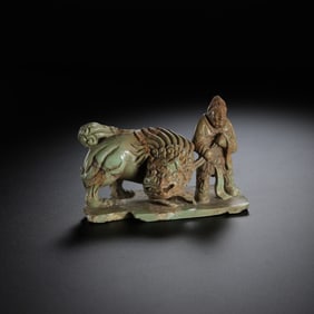 Turquoise statue of a foreigner leading a lion, Liao Dynasty, China