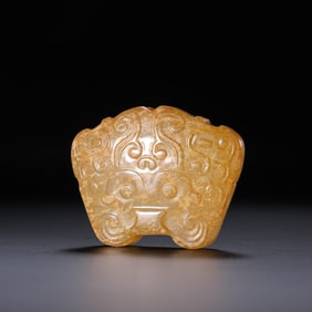 Chinese Han Dynasty Jade Pendant with Animal Face Design