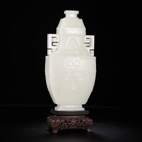 Chinese Qing Dynasty Hetian white jade animal face pattern double-eared cover vase