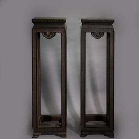 A pair of Chinese Qing Dynasty flower tables