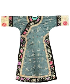 A Chinese Qing Dynasty lake green satin embroidered cloak with auspicious patterns