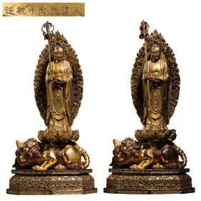 A pair of standing gilt bronze Buddha statues from the Qianlong period of the Qing Dynasty, China