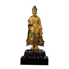 A standing gilt bronze Buddha statue from the Northern Wei Dynasty, China