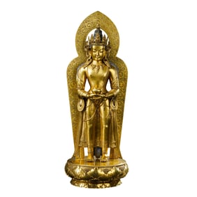 A Chinese Qing Dynasty gilt-bronze standing Mongolian Buddha statue