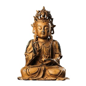 A Chinese Ming Dynasty gilt bronze statue of Seated Guanyin