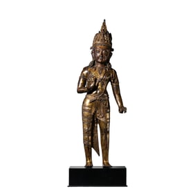 A Chinese Ming Dynasty gilt bronze standing Buddha statue