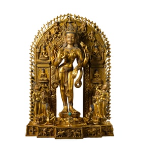 A Chinese Ming Dynasty gilt bronze standing Buddha statue