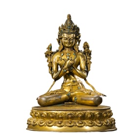 A Chinese Ming Dynasty gilt bronze and turquoise-inlaid seated Buddha statue