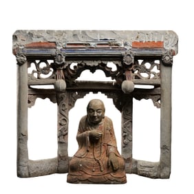 Chinese Yuan Dynasty stone painted seated Arhat statue