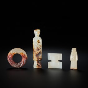 A group of small Chinese Han Dynasty jade pieces