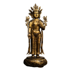A Chinese Qing Dynasty gilt-bronze standing Mongolian Buddha statue