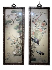 A pair of Chinese Qing Dynasty white satin embroidered frames with cranes, peacocks and flowers