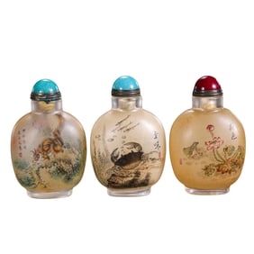 A group of Chinese Qing Dynasty glazed snuff bottles with animal patterns painted inside
