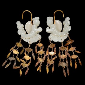 A pair of Chinese Liao Dynasty Hetian jade flying earrings