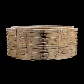 Chicken bone and white jade Cong from the Liangzhu culture of the Neolithic period in China