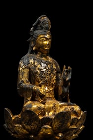 A Chinese Liao Dynasty gilt-bronze seated Buddha statue