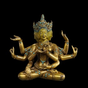 A Chinese Ming Dynasty gilt bronze statue of a seated Buddha