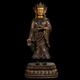 A Chinese gilt bronze standing Buddha statue from the Yongle period of the Ming Dynasty