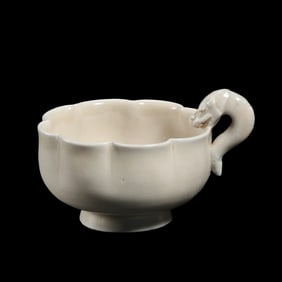 White porcelain cup with flower mouth handle from Gongxian kiln, Tang Dynasty, China
