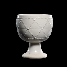 Chinese Tang Dynasty Gongxian kiln white porcelain drum nail pattern high-footed cup