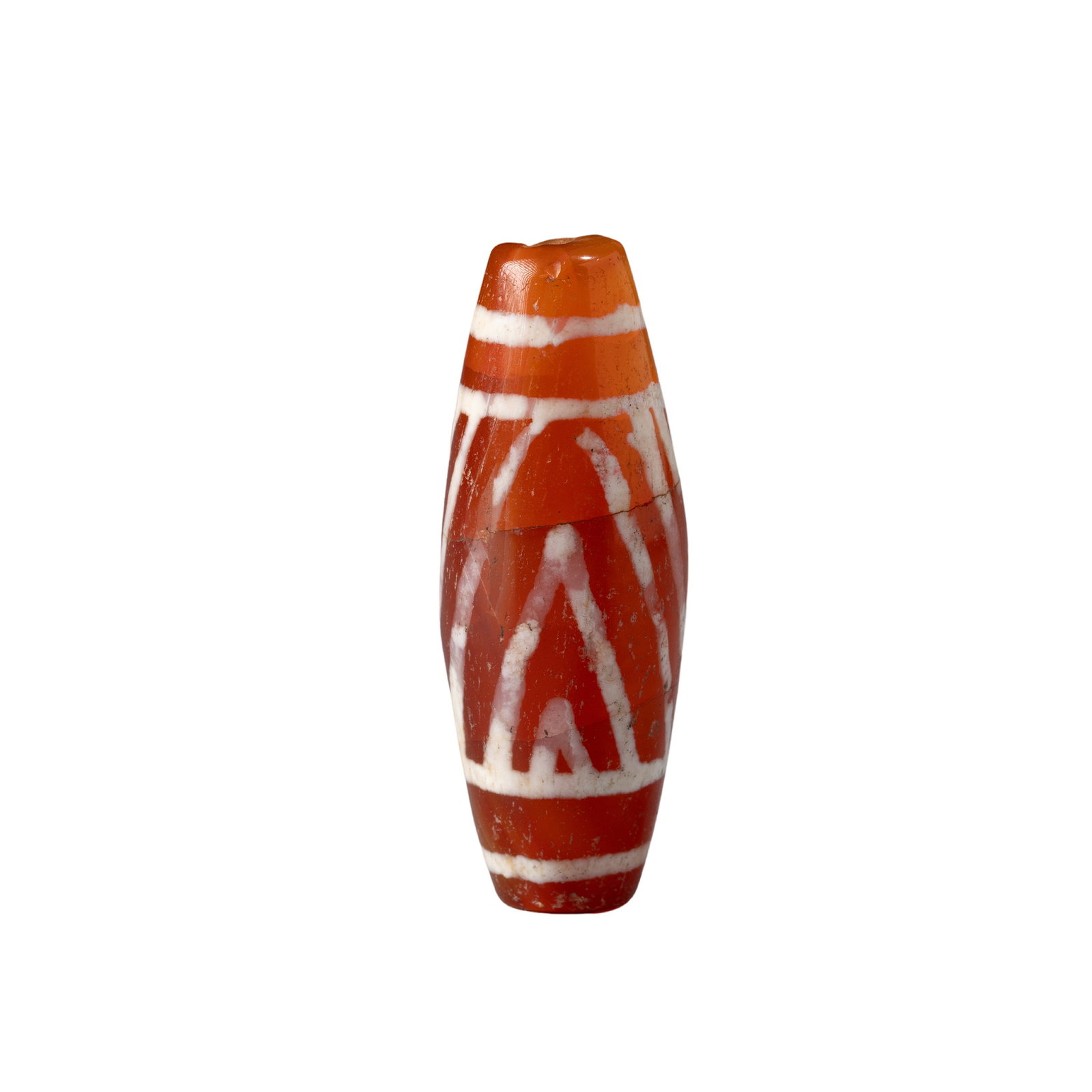 Banded Agate Bead: Date: Circa 200 BCE – 200 CE?Culture: Central Asian or Gandharan Culture?Material: Agate?Dimensions: 3.3 cm (length); 1.2 cm (diameter)?Weight: 6 g?Condition: Well-preserved with minor surface wear 