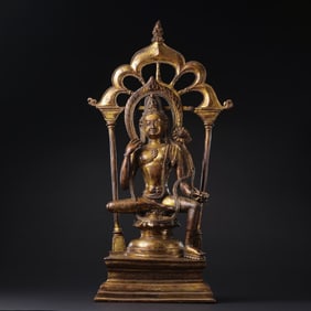 15th Century Tibetan Gilt Bronze Seated Buddha