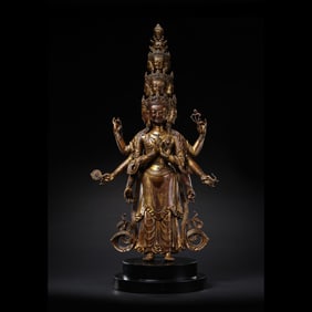 15th Century Tibetan Gilt Bronze Standing Eleven-Headed Avalokiteshvara (Ekadasamukha Sahasrabhuja
