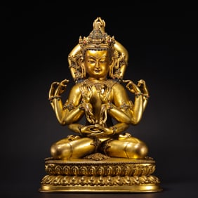 16th Century Tibetan Gilt Bronze Multi-Armed Seated Buddha