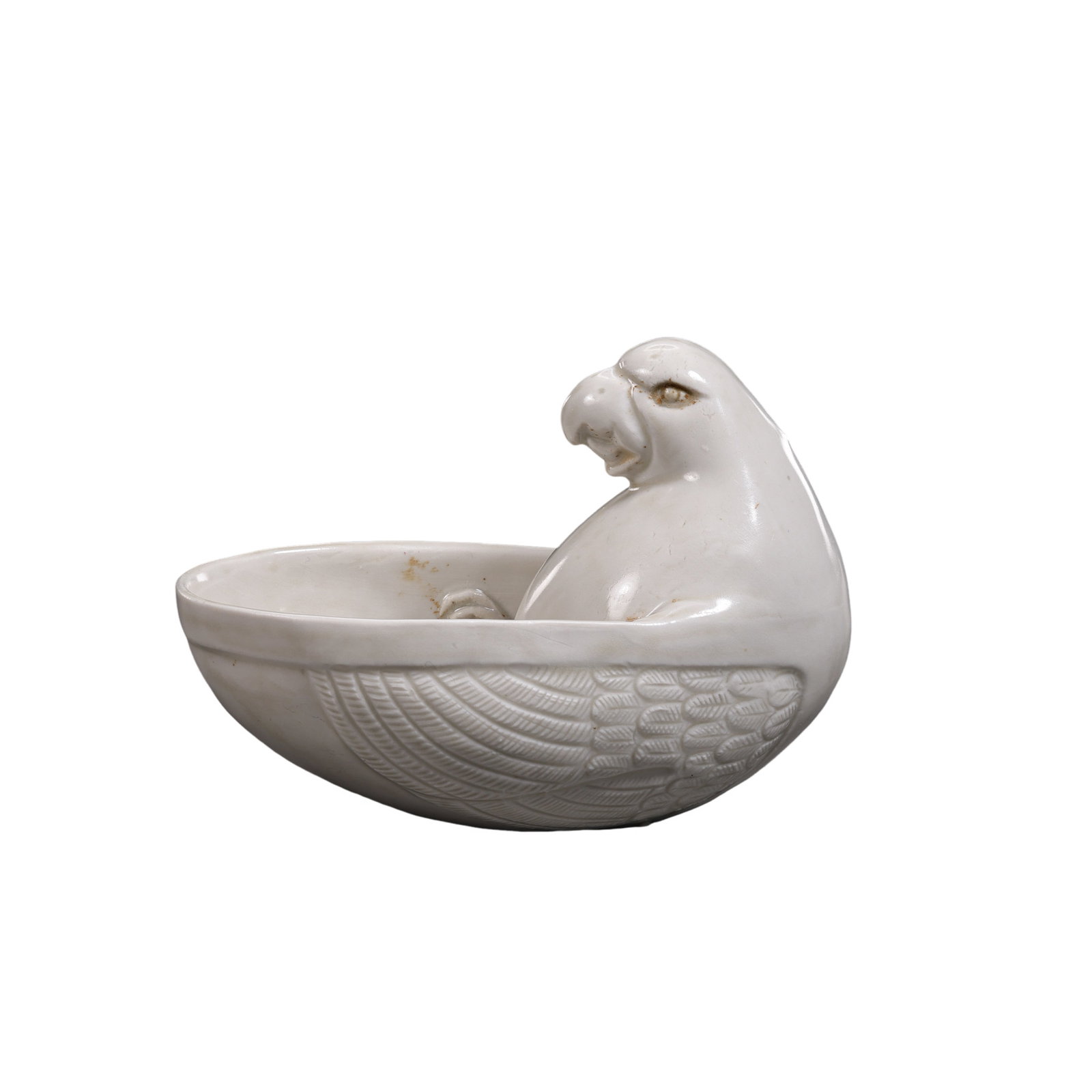 A Northern Song Dynasty Ding Ware White-Glazed Parrot Cup: Height: 8.5 cm; Width: 11.5 cmCondition and Provenance?In good overall condition. The form remains intact, with an even white glaze of soft, mellow tone. Minor kiln-related specks, light surface wear,