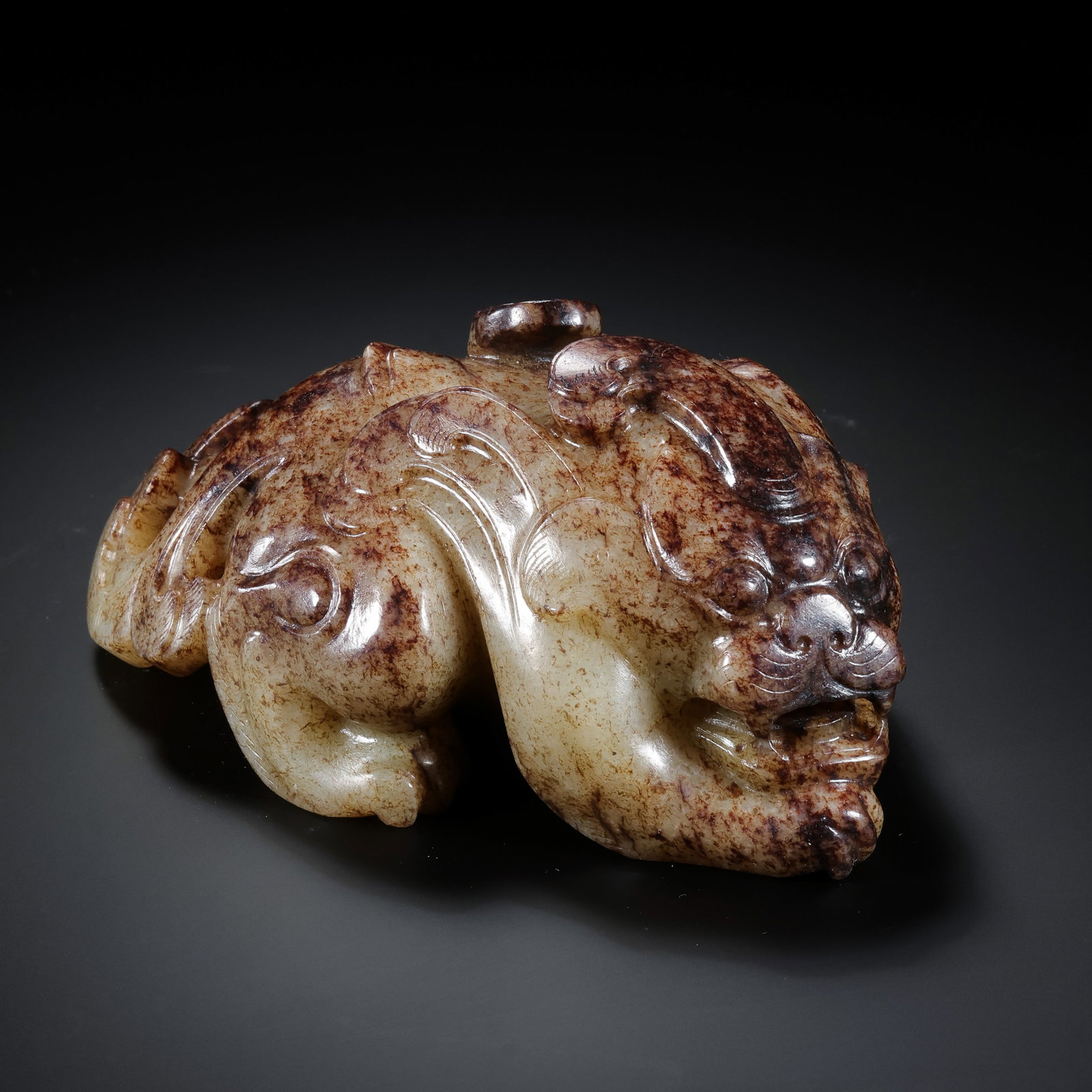 A Chinese Warring States Hetian Jade Recumbent Beast (1 of 9)