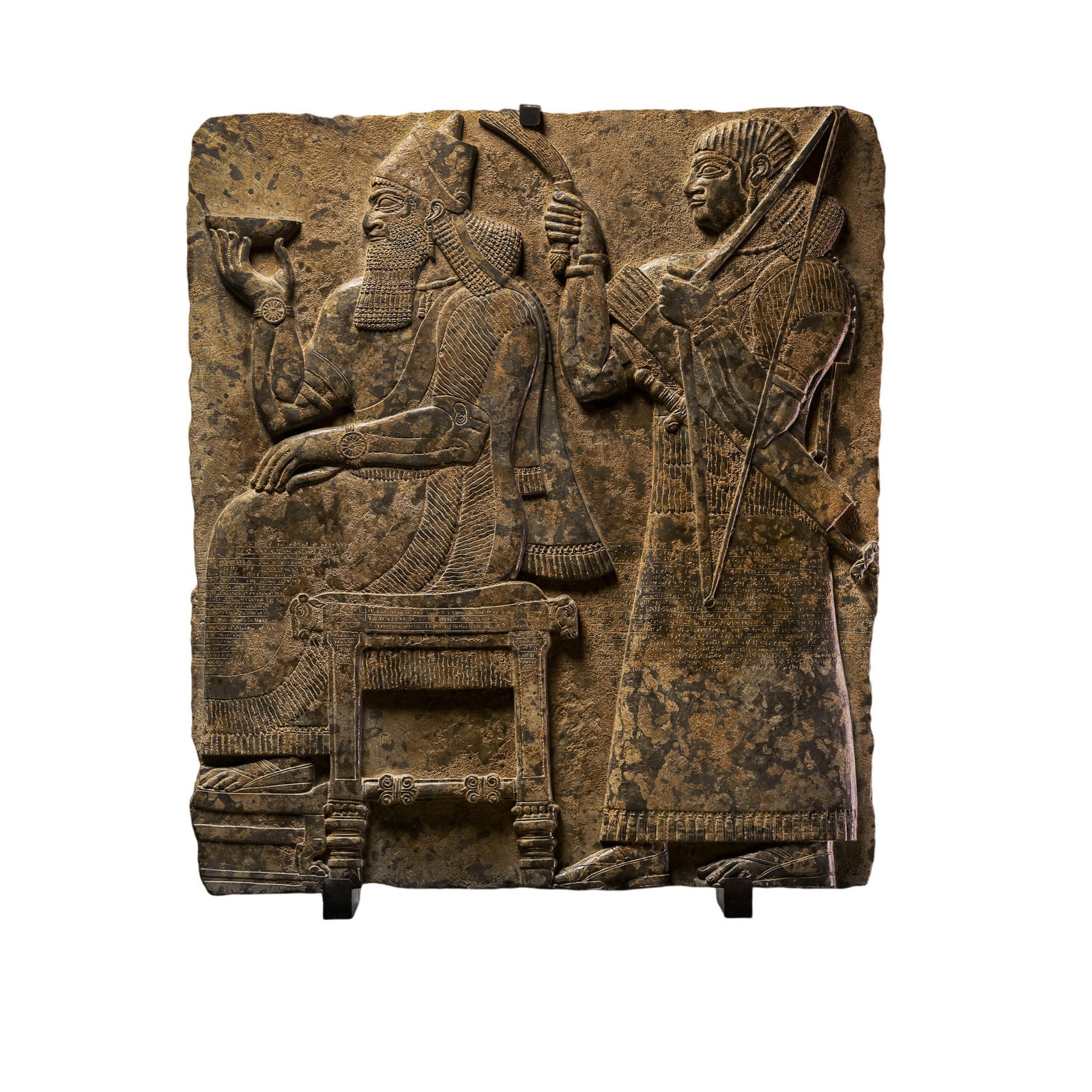 Western Asia, Mesopotamian Civilization, Neo-Assyrian Style Stone Figural Narrative Relief: Style of circa 9th–7th century BCE; Width: 72 cm / 28.35 in / 2.36 ft; Relief Height: 80 cm / 31.50 in / 2.62 ft; Overall Height with Stand: 95 cm / 37.40 in / 3.12 ftCondition & Provenance: Good ov