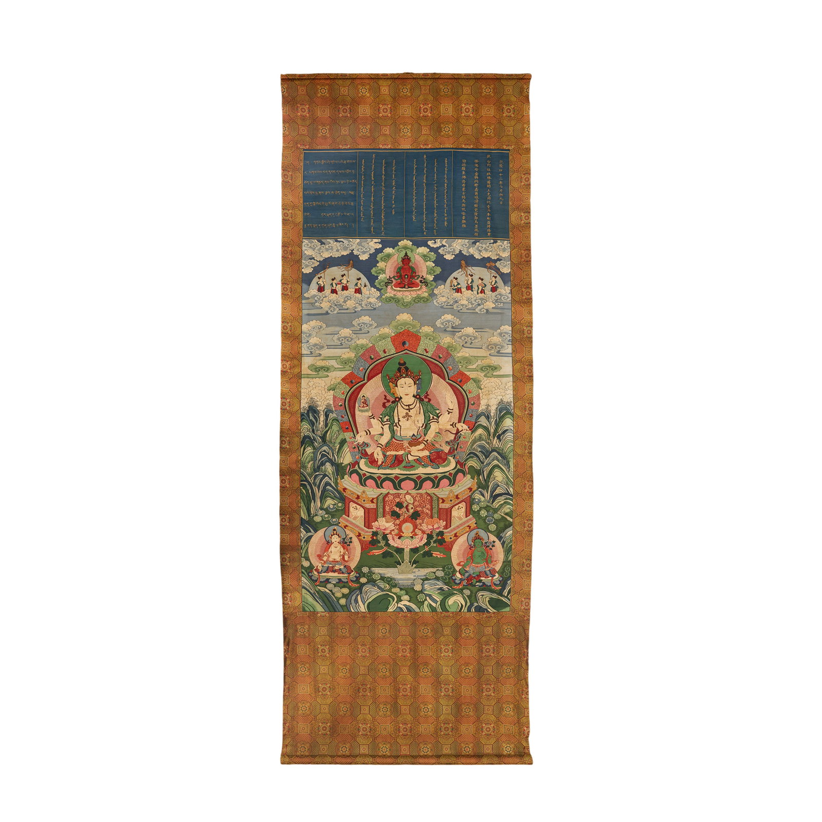 An Imperial Qianlong Brocade-Mounted Thangka of Green Tara, Qing Dynasty: 18th century; Height: 294.5 cm (approx. 115.94 in); Width: 105.6 cm (approx. 41.57 in)Condition and Provenance?In good overall condition. The mounting structure remains substantially intact, including