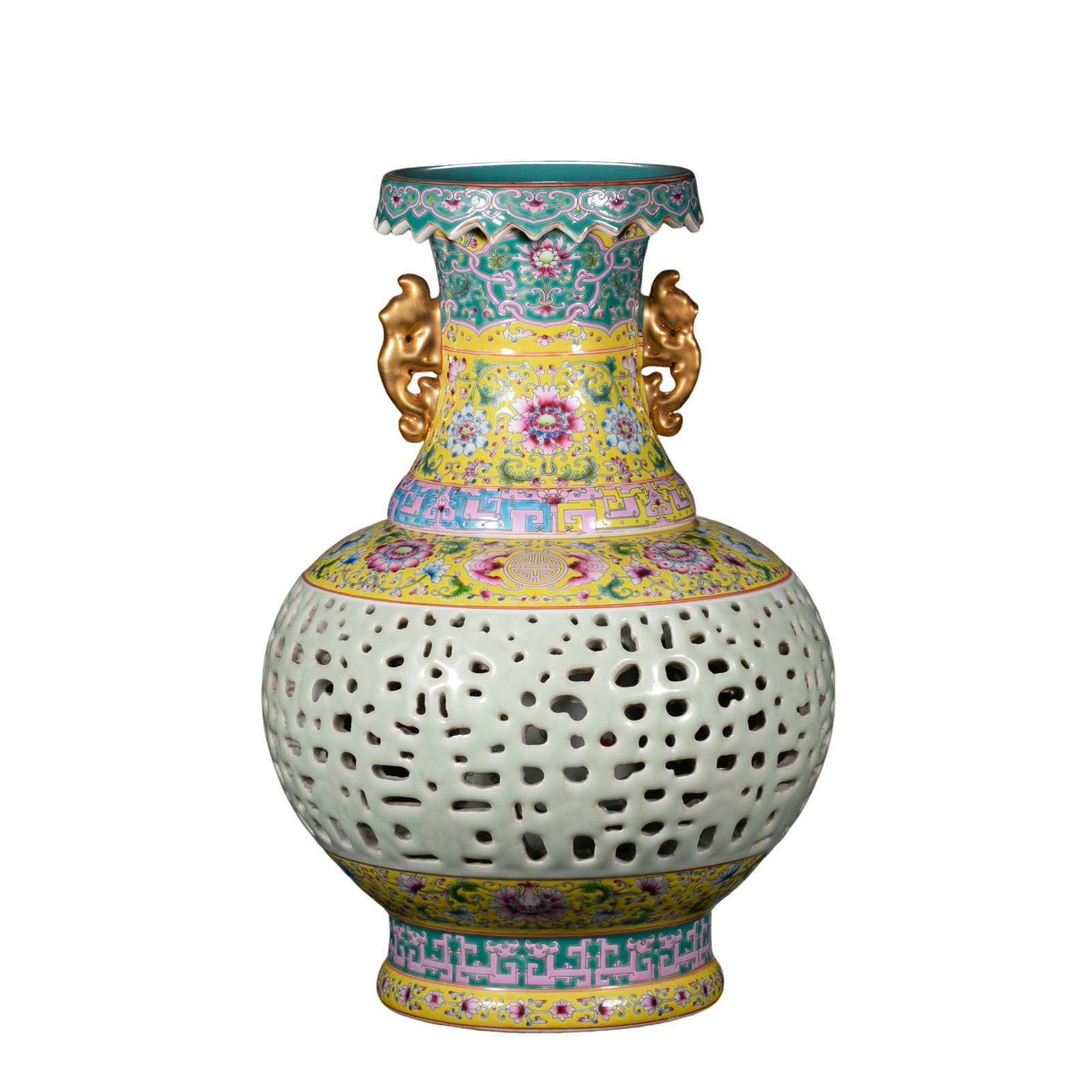 Yongzheng Famille-Rose Reticulated Revolving Vase, Qing Dynasty: 18th century; Height: 39 cm (approx. 15.35 in); Mouth diameter: 14 cm (approx. 5.51 in)Condition and Provenance?In good overall condition. The vase is complete in form and elaborately decorated throug