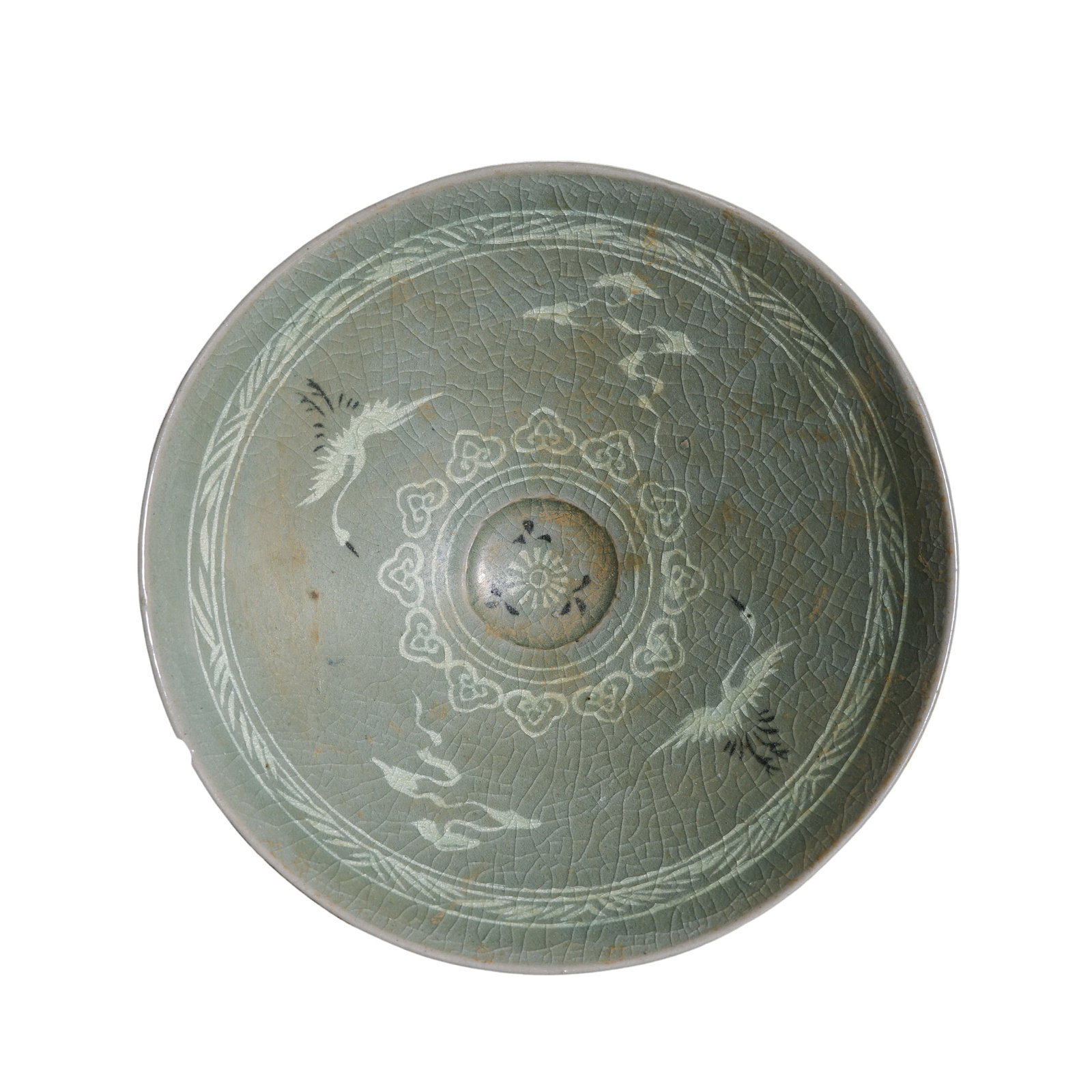 Korean Goryeo Celadon Bowl: Goryeo dynasty, circa 12th–14th century; Diameter: 14.6 cm (approx. 5.75 in); Height: 4.7 cm (approx. 1.85 in)Condition and Provenance?There is a noticeable chip to the rim. The glaze is otherwise g