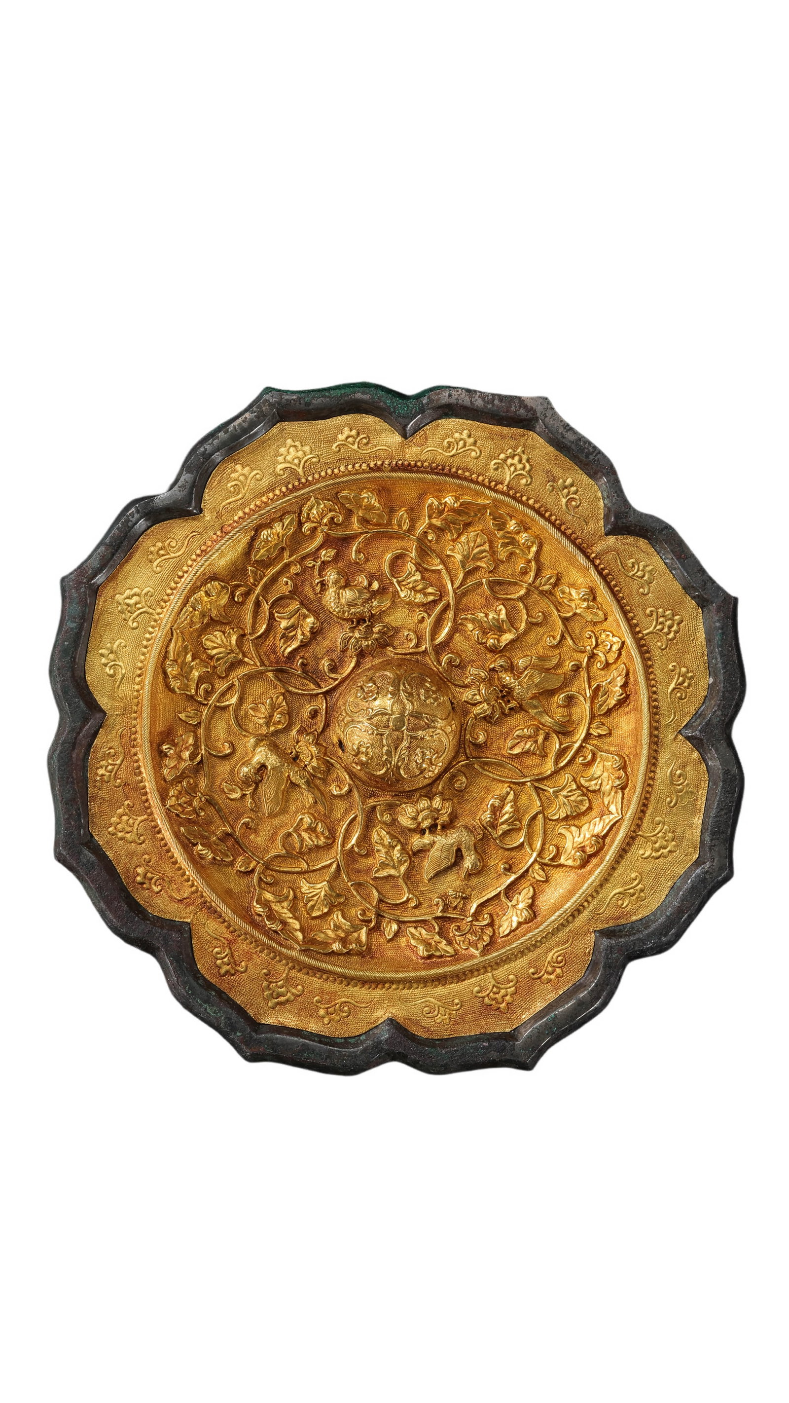 Chinese Tang Dynasty Gold-Inlaid Bronze Lobed Mirror with Birds, Flowers, and Grapevine Decoration: Circa 7th–9th Century?Diameter: 13.5 cm / approx. 5.31 in / approx. 0.44 ft?Weight: 667 gCondition and Provenance?Condition: The mirror is generally well preserved, with a regular lobed outline and 