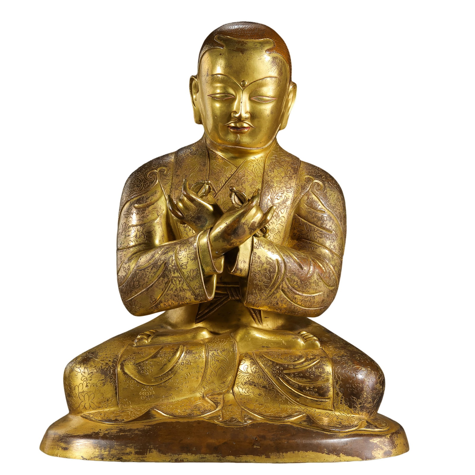 15th-Century Tibetan Gilt-Bronze Seated Lama: 15th century; height: 45.5 cm / 17.91 in; width: 38.5 cm / 15.16 in; weight: 22 kg / 48.50 lbCondition and Provenance?Condition: Overall in good condition. The main figure is structurally intact. Much