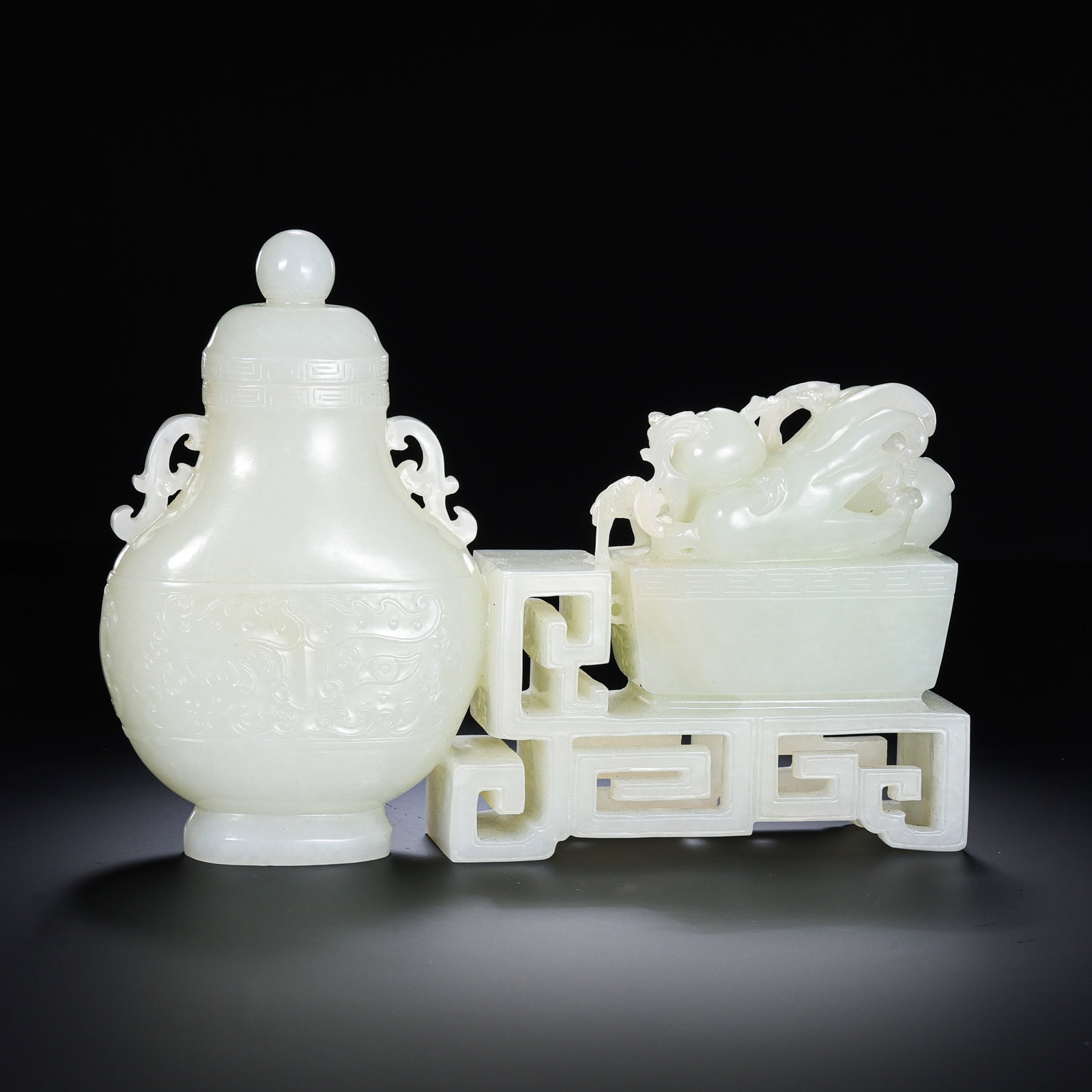 Qing Dynasty Hetian Jade Covered Vase with Beast Finial and Ruyi Stand: Qing dynasty; length: 17 cm / 6.69 in; height: 12.5 cm / 4.92 in; weight: 815 g / 28.75 ozCondition and Provenance?Condition: Overall in good condition. The Hetian jade is smooth and finely polished, 