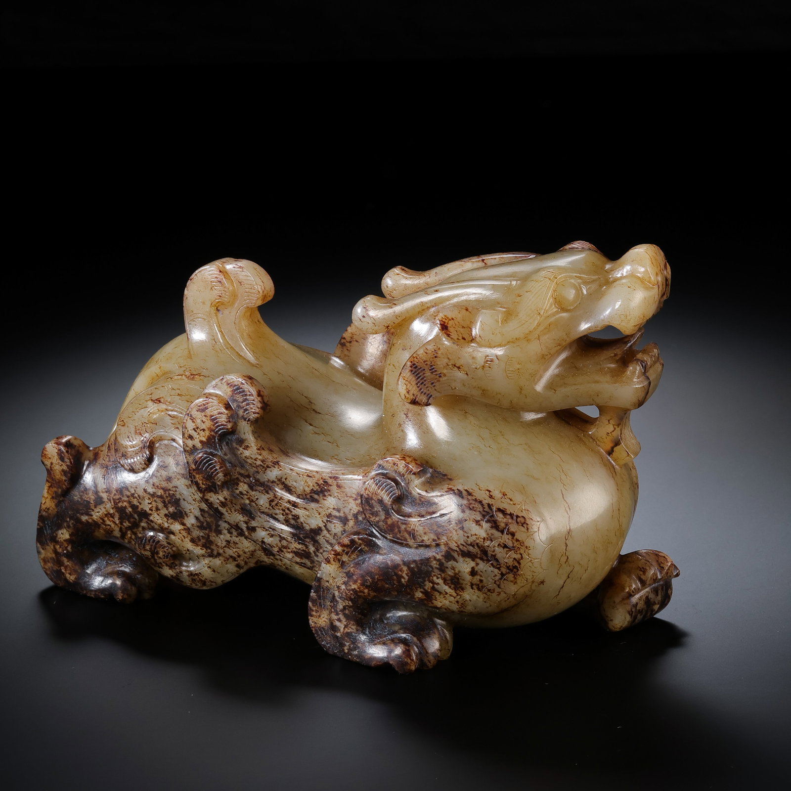 Warring States Period Hetian Jade Recumbent Mythical Beast: 5th–3rd century BCE; Length: 12.5 cm, approximately 4.92 in, approximately 0.41 ft; Height: 8.3 cm, approximately 3.27 in, approximately 0.27 ft; Weight: 690 gCondition and Provenance?Condition: Ove