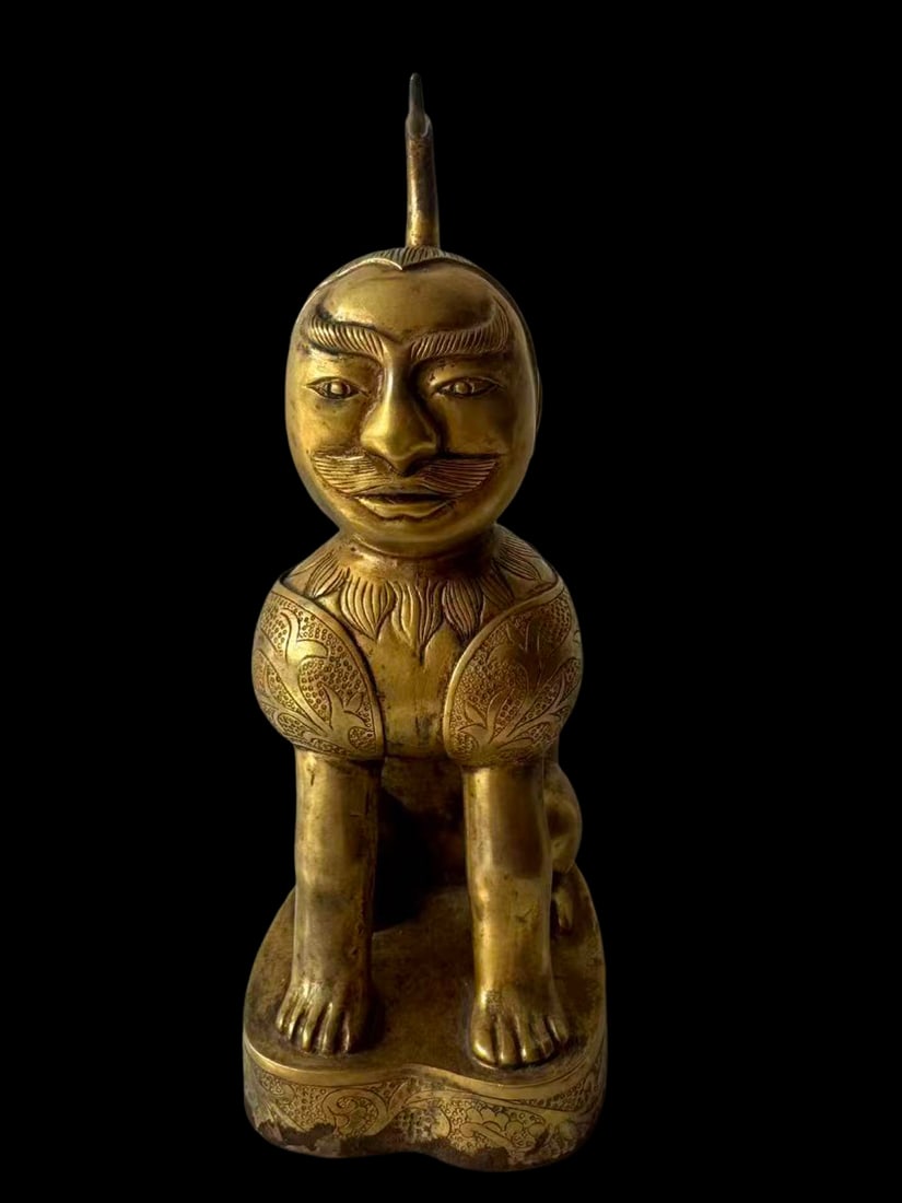 Liao Dynasty Nobleman-Headed Lion-Form Guardian Beast: 10th–12th century; L. 10 cm (3.94 in), W. 5 cm (1.97 in), H. 17 cm (6.69 in)Condition & Provenance: Good condition, with natural oxidation, patina, localized wear, and age-related signs of use; priv