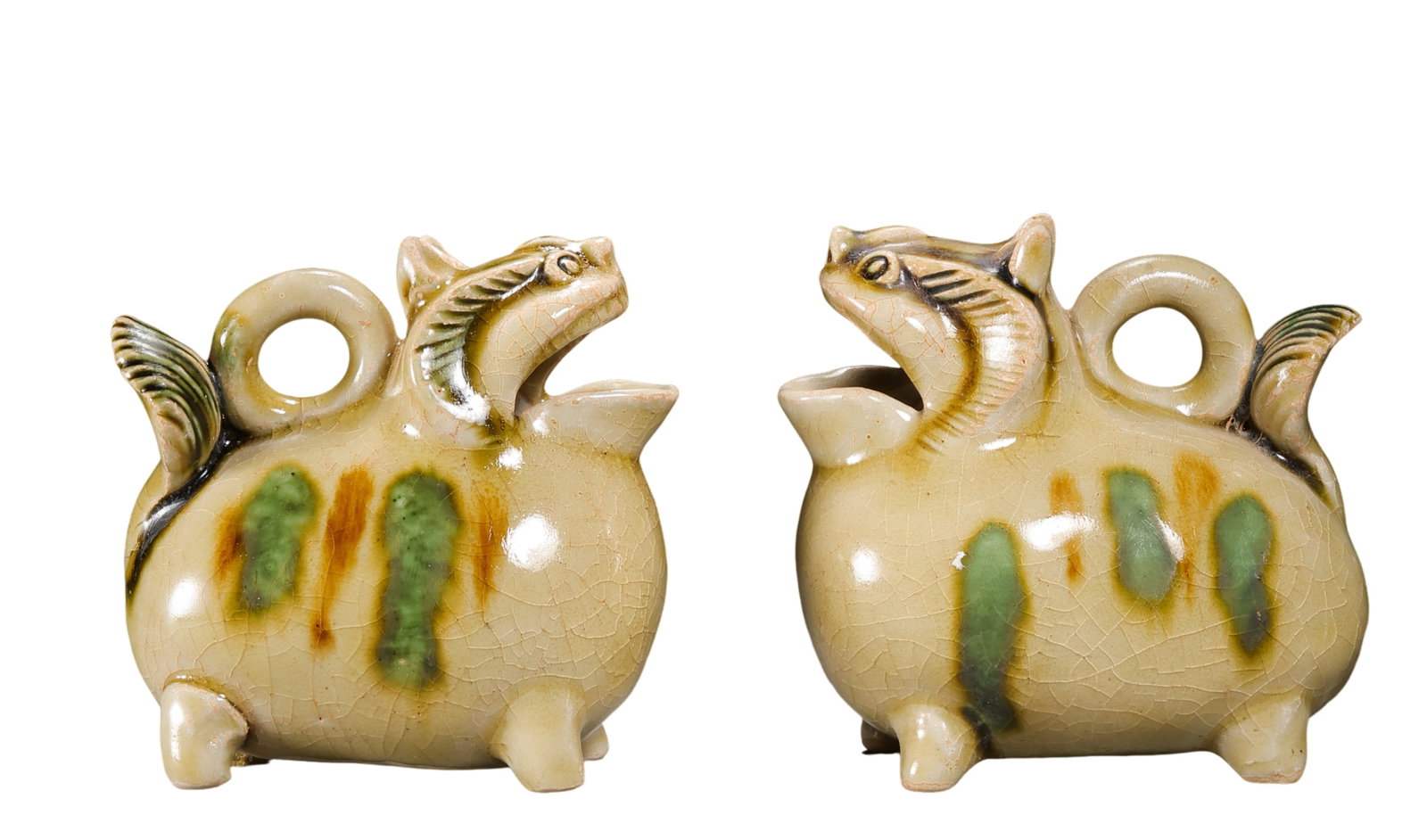 Tang Dynasty Pair of Sancai Beast-Head Water Droppers: 7th–10th century; Left: Height 8.3 cm, approximately 3.27 in, approximately 0.27 ft; Width 8 cm, approximately 3.15 in, approximately 0.26 ft; Right: Height 8.5 cm, approximately 3.35 in, approximat