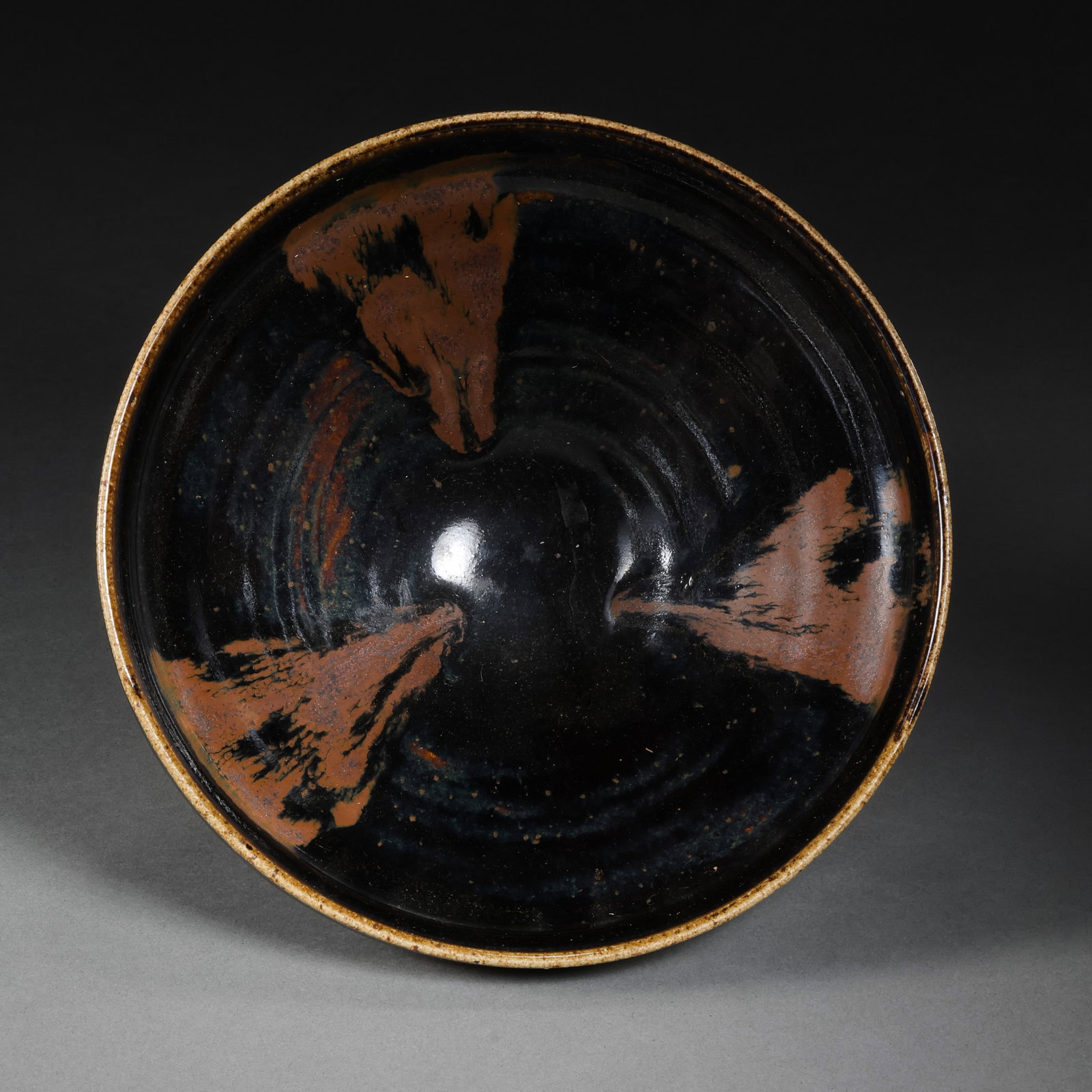 Song Dynasty Cizhou-Type Black-Glazed “Rust-Splashed?? Tea Bowl: 10th–13th century; Diameter: 17.7 cm, approximately 6.97 in, approximately 0.58 ft; Height: 8.5 cm, approximately 3.35 in, approximately 0.28 ftCondition and Provenance?Condition: Overall well prese