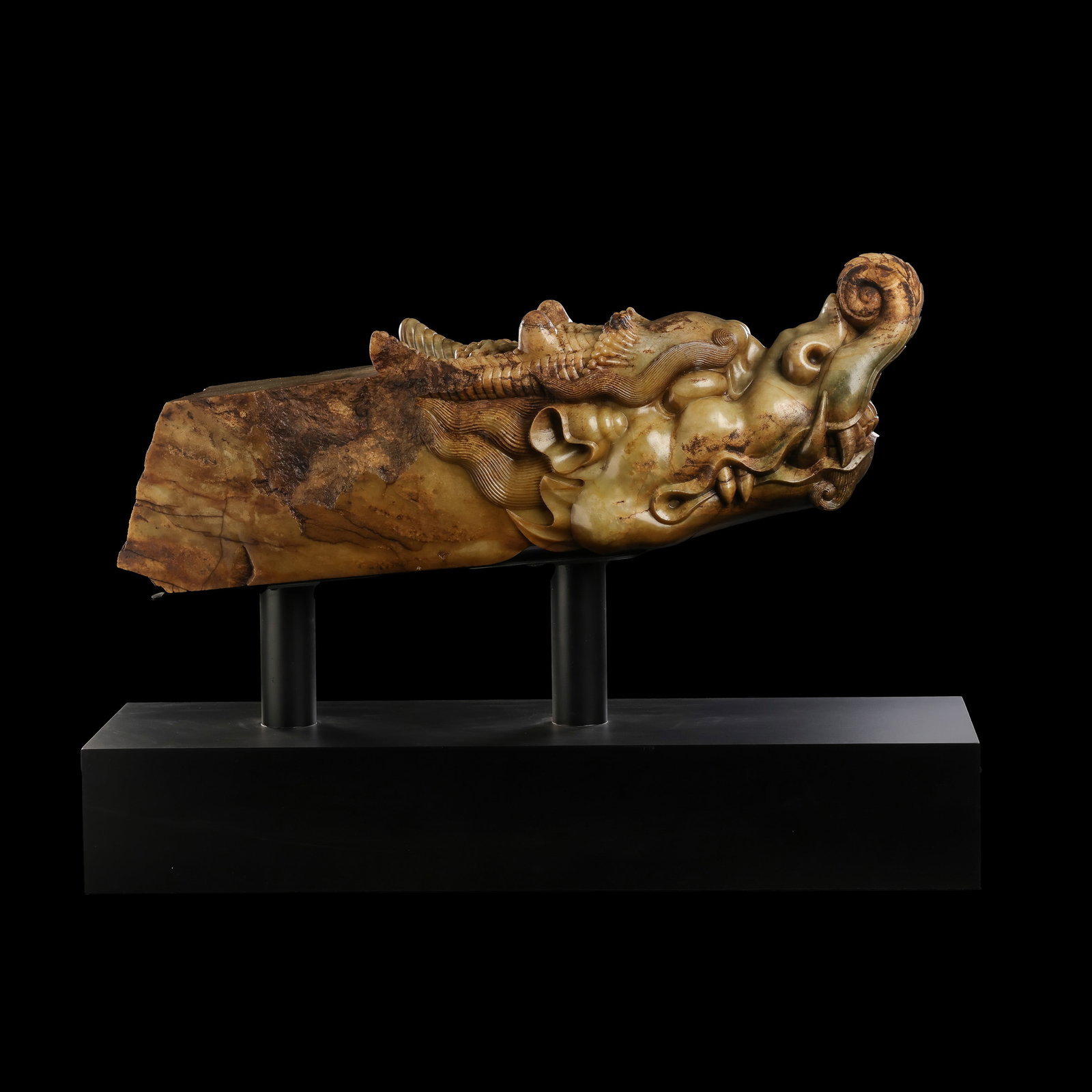 Tang Dynasty Large Hetian Jade Dragon-Head Display Sculpture: 7th–10th century; Length: 71 cm, approximately 27.95 in, approximately 2.33 ft; Height: 23 cm, approximately 9.06 in, approximately 0.75 ft; Height with stand: 51 cm, approximately 20.08 in,