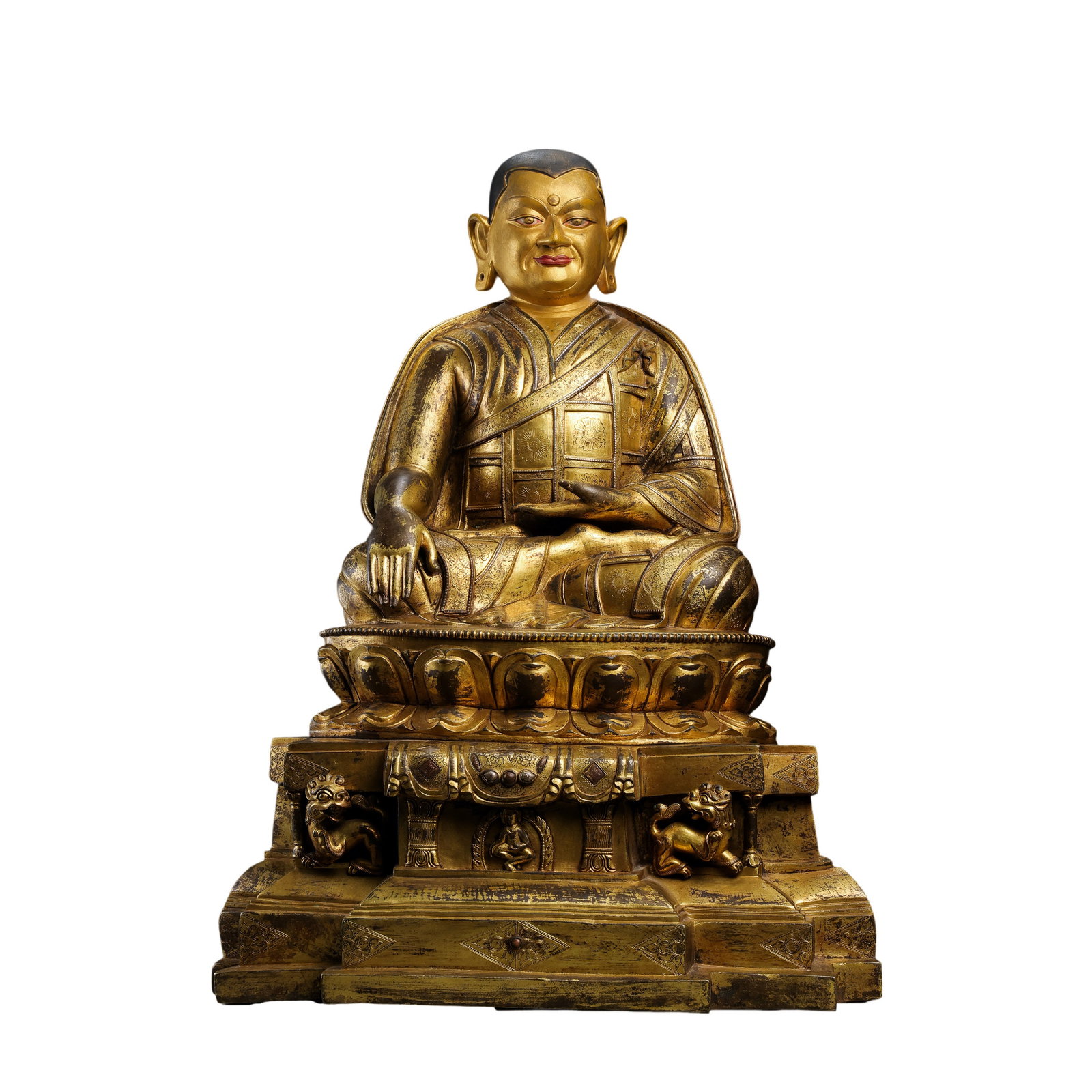 Tibet, 15th Century, Gilt-Bronze Seated Lama Figure: 15th century; H. 49.5 cm (19.49 in; 1.62 ft); W. 39 cm (15.35 in; 1.28 ft); Weight: 18,513 gCondition & Provenance?Condition: Overall well preserved with substantial remnants of original gilding. Area