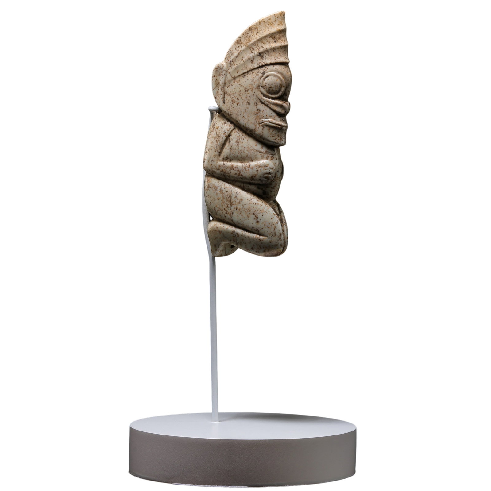 Neolithic Hongshan Culture Chicken-Bone White Hetian Jade Sun Deity Pendant: c. 4700–2900 BCE; Object height: 15 cm (5.91 in; 0.49 ft); Width: 6.5 cm (2.56 in; 0.21 ft); Height with stand: 29 cm (11.42 in; 0.95 ft); Weight: 344 gCondition & Provenance?Condition: Overall well