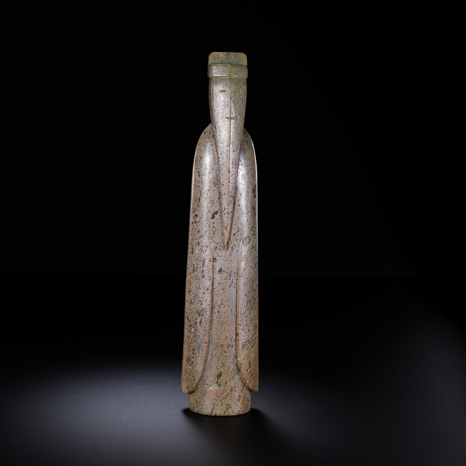 Warring States Period Hetian Jade Abstract Standing Figure: 5th–3rd century BCE; H. 25 cm (9.84 in; 0.82 ft); W. 5 cm (1.97 in; 0.16 ft); Weight: 778 gCondition & Provenance?Condition: Overall in good condition. The jade is dense and finely textured, with a 