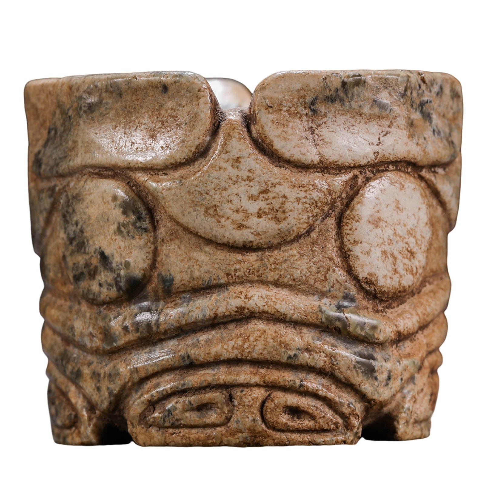 Neolithic Hongshan Culture Hemo Jade Cong with Mask Design: 7500–2900 BCE; H. 4 cm (1.57 in), W. 4.5 cm (1.77 in); Wt. 138 gCondition & Provenance: Good condition, with natural coloration, calcification, jade texture, and age-related surface wear; formerly i