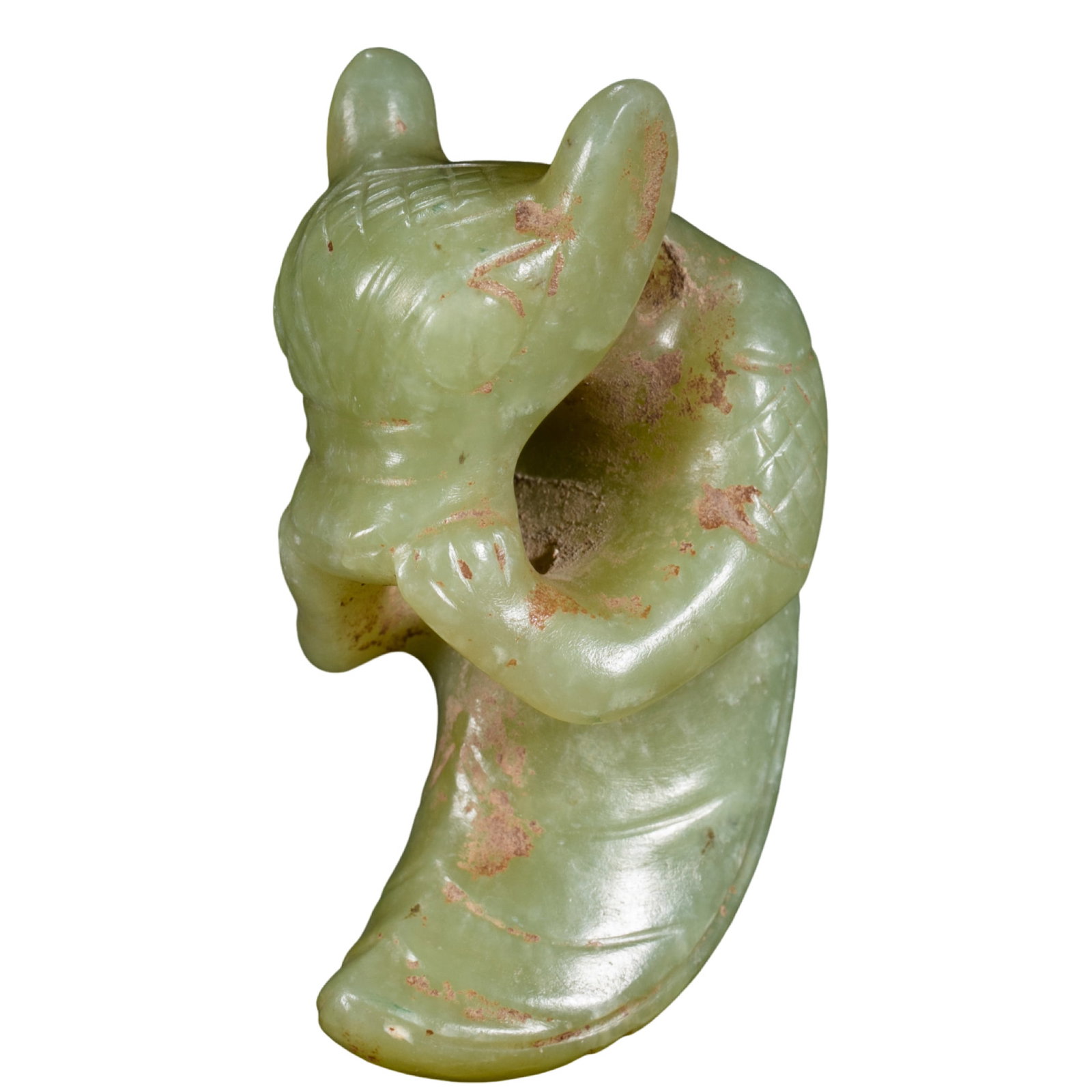 Neolithic Period, Hongshan Culture, River-Polished Jade Deity-Form Pendant: 7500–2900 BCE; Height: 6.2 cm / 2.44 in / 0.20 ft; Width: 3.3 cm / 1.30 in / 0.11 ft; Weight: 68 g / 2.40 ozCondition & Provenance: Good overall condition, with natural surface alteration, russet-br