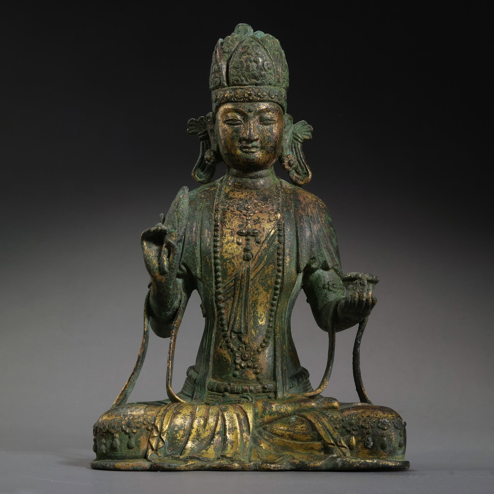 Dali Kingdom Gilt-Bronze Seated Bodhisattva: 10th–13th Century; H. 24.5 cm, W. 16.5 cm; Weight 2730 g; H. approx. 9.65 in, W. approx. 6.50 inCondition and Provenance: Good condition, with the overall structure intact, natural wear to the gildi