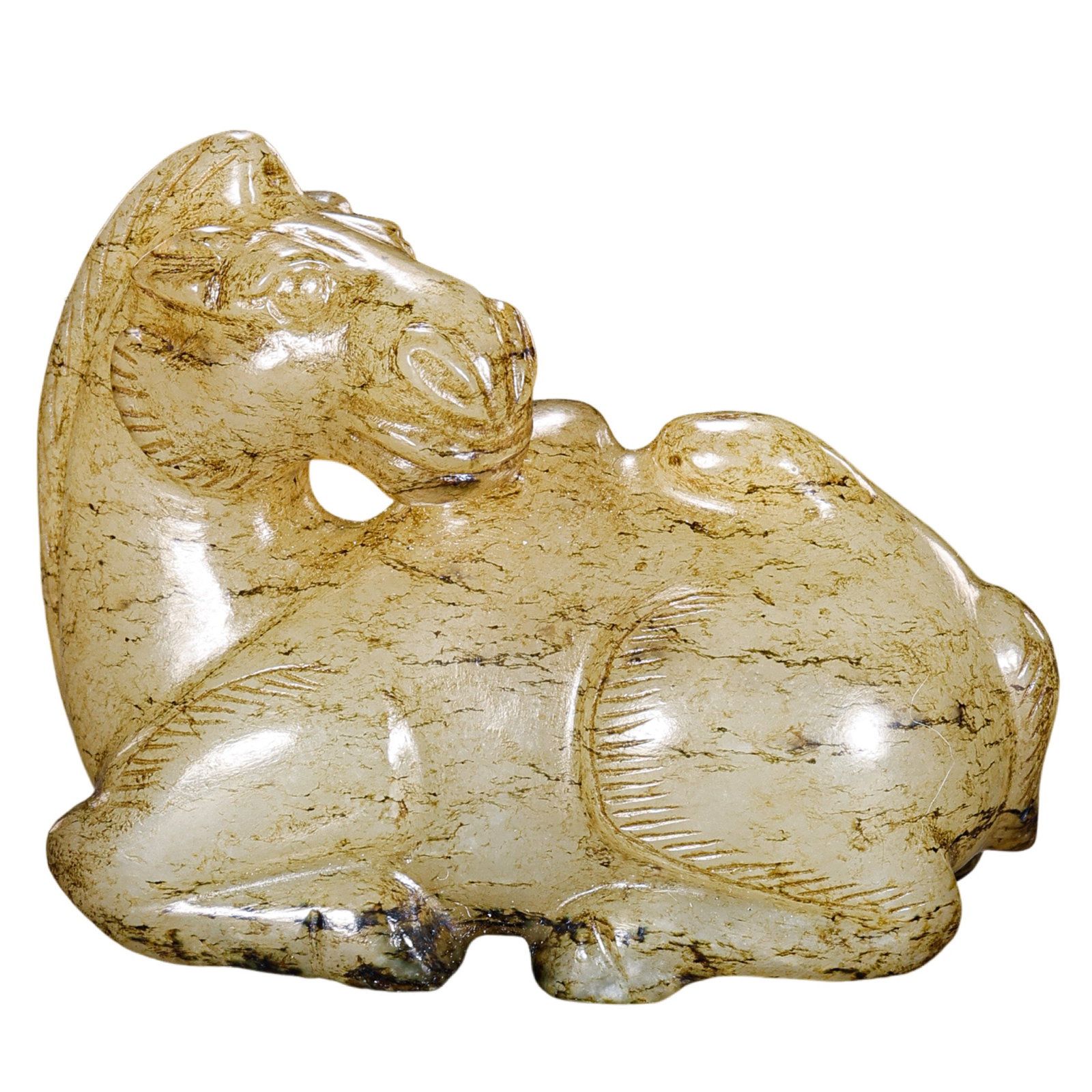 Han Dynasty Hetian Jade Recumbent Horse Pendant: 2nd Century BCE–2nd Century CE; L. 4.5 cm, H. 4 cm; Weight 59 g; L. approx. 1.77 in, H. approx. 1.57 inCondition and Provenance: Good condition, with the overall form intact, warm jade texture, natu
